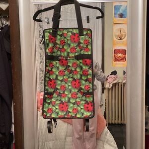 Ladybug Print Rolling Shopping Tote Bag fold up and fold out
